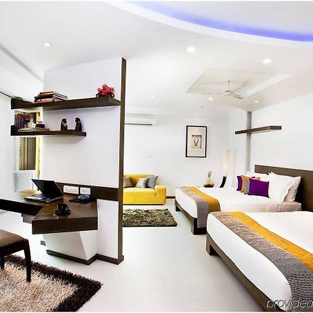 Melange Astris Aparthotel Bengaluru Szoba fotó